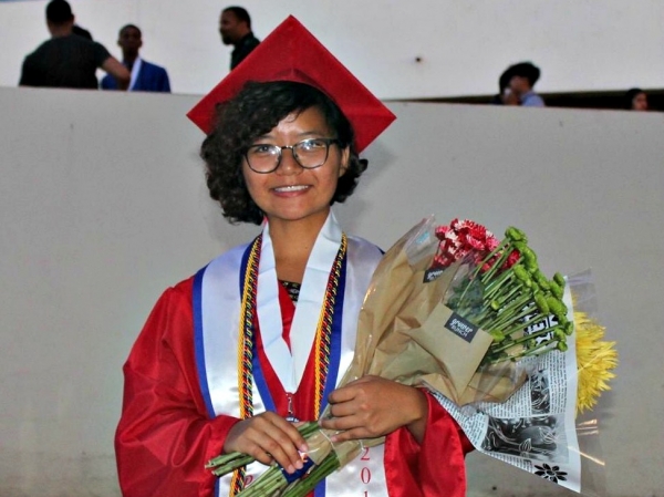 Joan graduates high school with honors in Phoenix, Ariz.