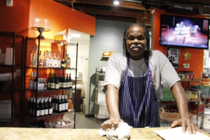 Saleto Henderson is one of 16 veterans projected to learn valuable work skills through a training program at The Refuge in 2016. He still works at the café and wine bar run by Catholic Charities.